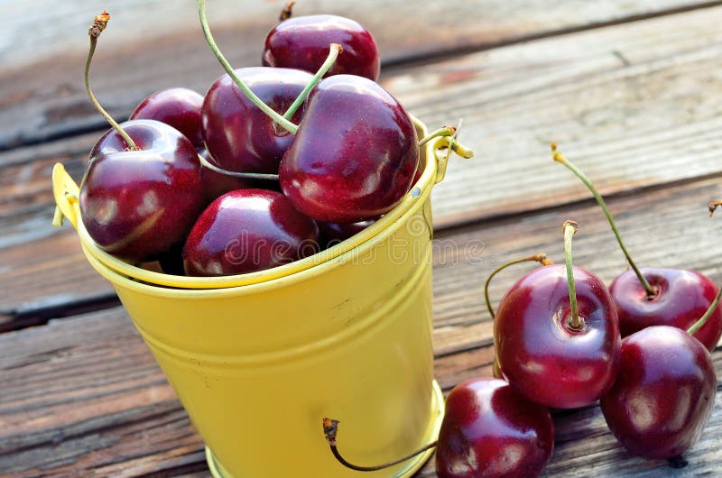 Red Cherries in a Yellow Bucket Stock Photo Image of food, healthy