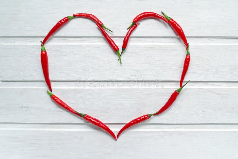 Red Chili Pepper Heart on White Wood Background. Love Hot Spicy Mexican ...