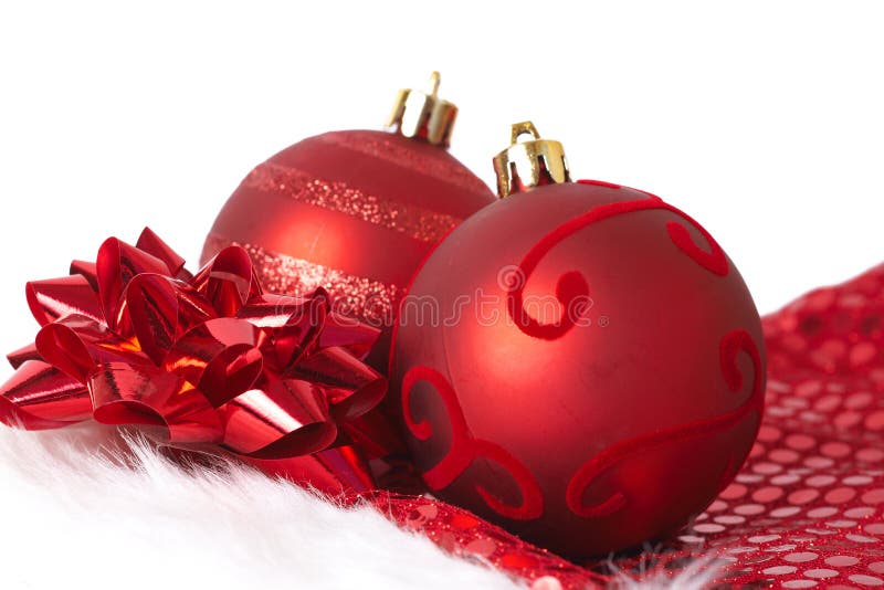 Red Christmas baubles on Santa hat