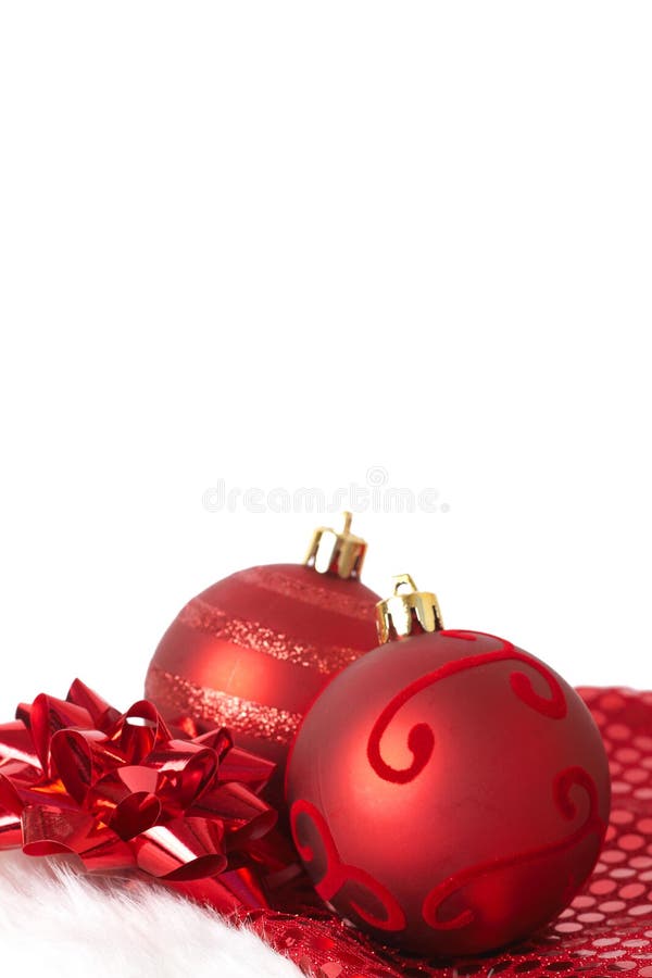 Red Christmas baubles on Santa hat