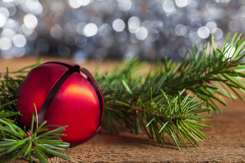 Red Christmas Bell with Pine Bough and Bokeh