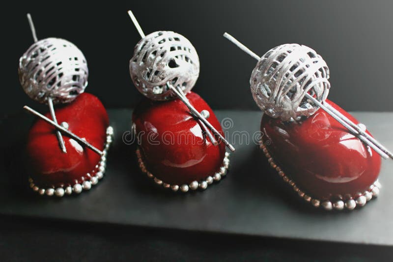 Red christmas berry desserts with silver wool ball decoration and brownie stock photography Red christmas berry desserts with silver wool ball decoration and brownie stock photography