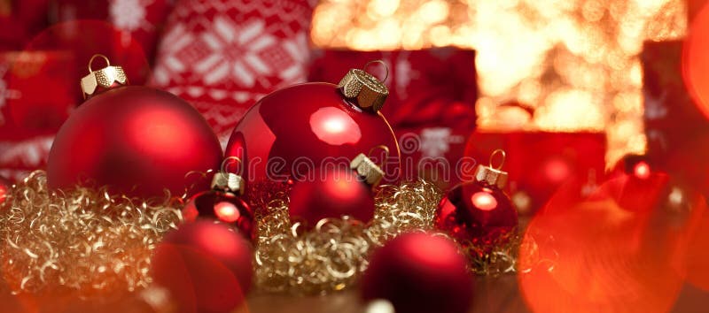 Red christmas decoration gifts and christmas tree deco.