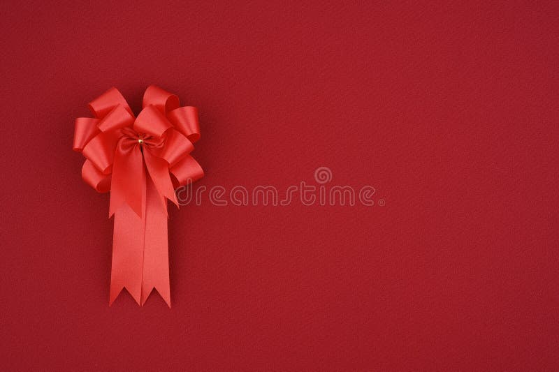Red Christmas gift bow and ribbon on Fabric for background. Seamless bow stock images, royalty-free photos and pictures