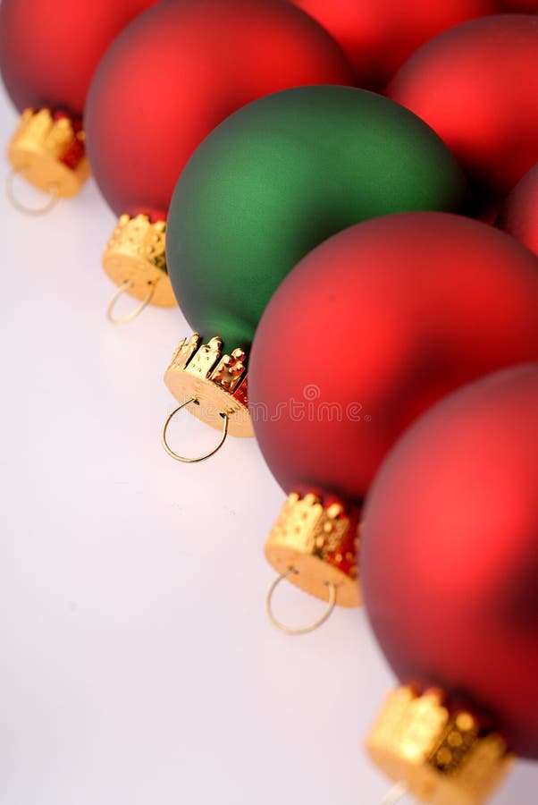 Red Christmas Tree Ornaments with One Green Stock Image - Image of ...