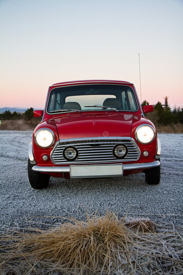 Photo of a Retro Mini Cooper Car Logo Badge on a Red Mini Cooper Car.  Editorial Photo - Image of chrome, motor: 144682971