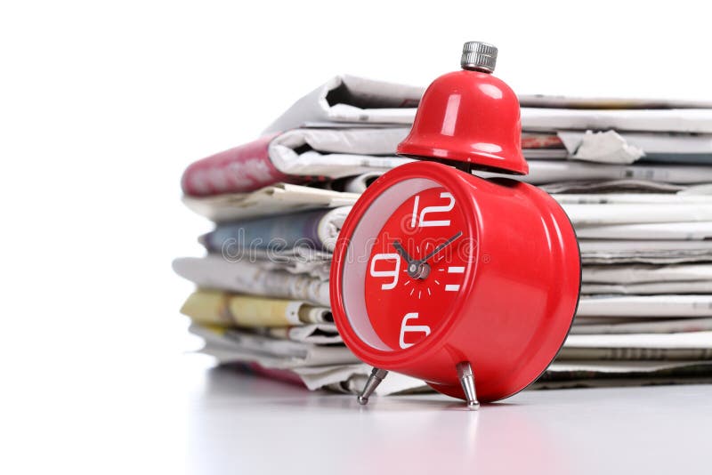 Red clock and newspaper stock image. Image of business 12321543