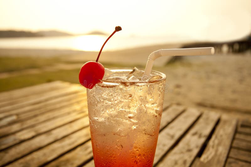 Red cocktail on beach