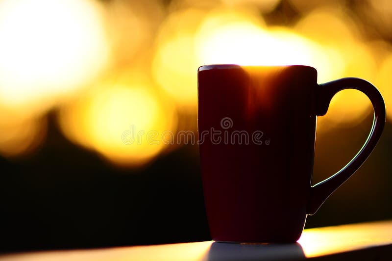 Red Coffee Cup Overflowing with a Sunrise Stock Photo Image of decaf, view 12212294