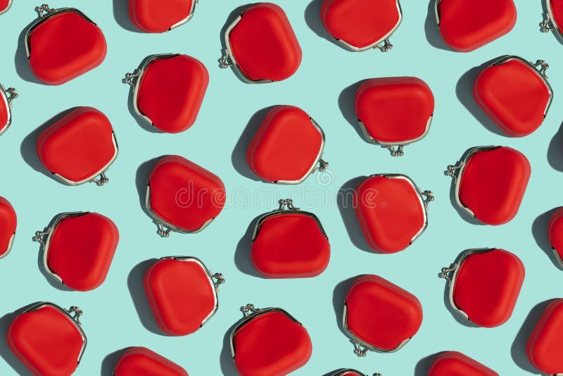Red Coin Purse on blue background, flat lay stock photography