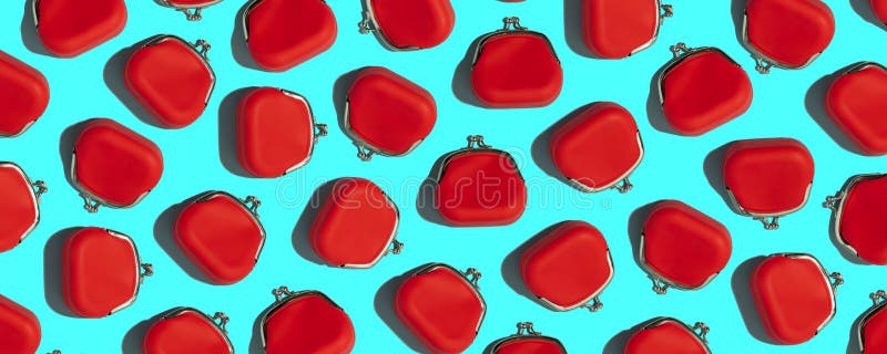 Red Coin Purse on blue background, flat lay stock images