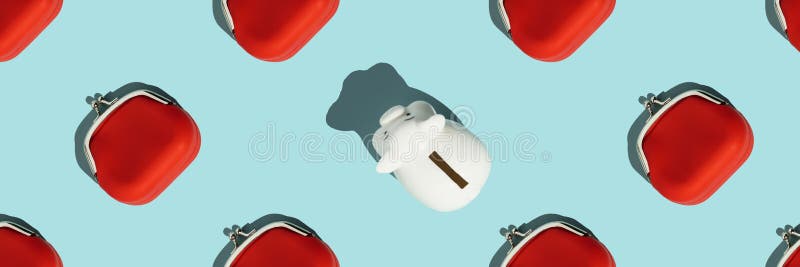 Red Coin Purse and piggy bank on blue background, flat lay stock photos.