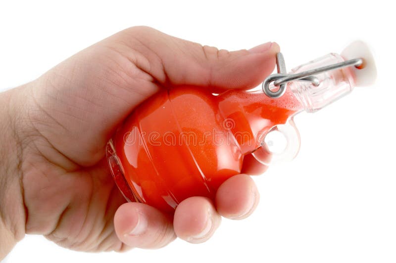 Red Color Flask. My Hand is opening and pouring red color