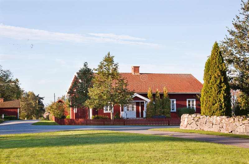 Red cottage. stock photo. Image of landscape, plant, door 21376422
