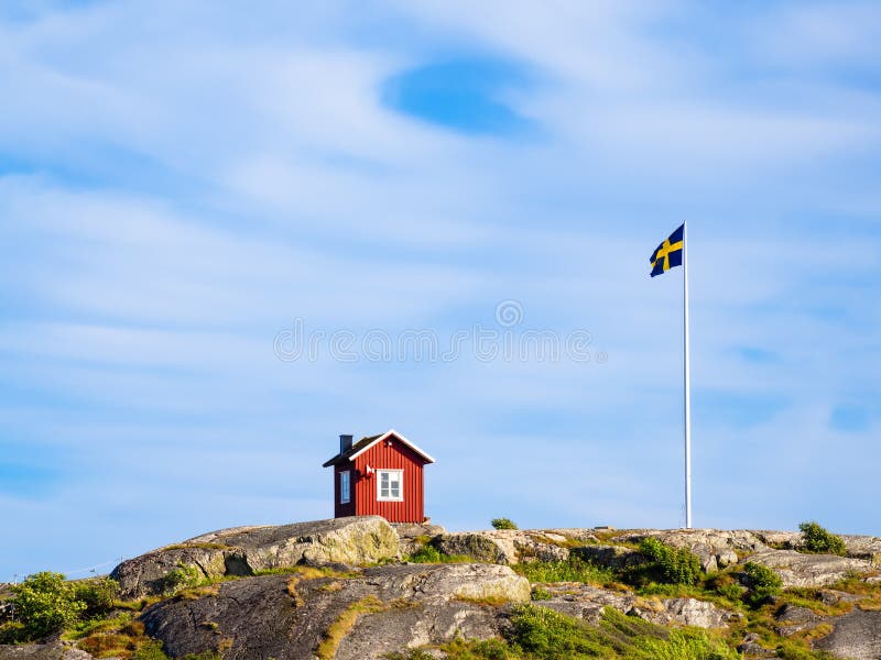 Red Cottage on the Hill of Island of Vrango in Sweden Stock Image