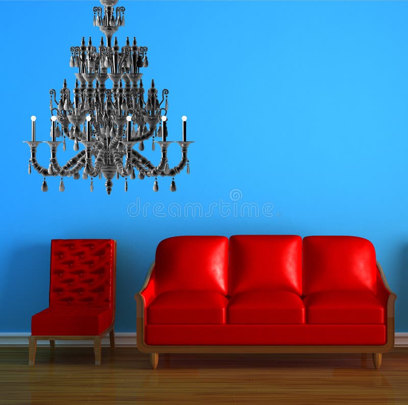 Red couch and chair with chandelier