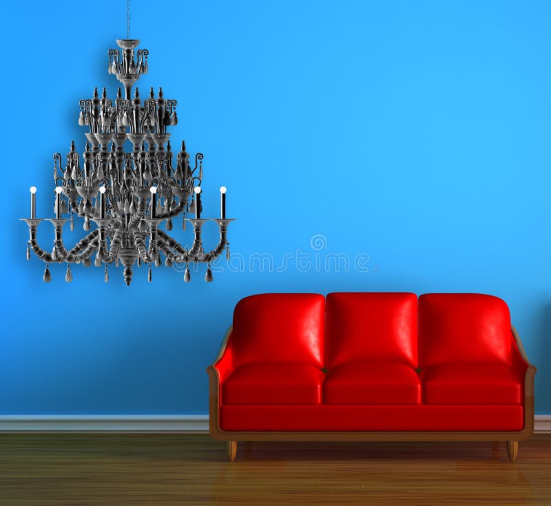 Red couch with chandelier