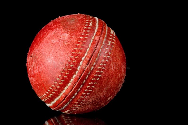 Red Cricket Ball on Black Background Stock Photo - Image of scuffed
