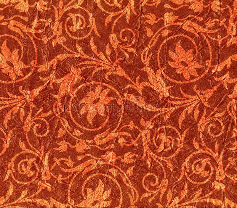 Expensive red crumpled fabric with flower pattern