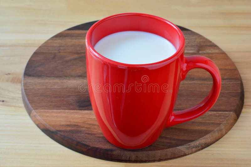 Red cup of fresh milk stock image. Image of nutrition 84643283