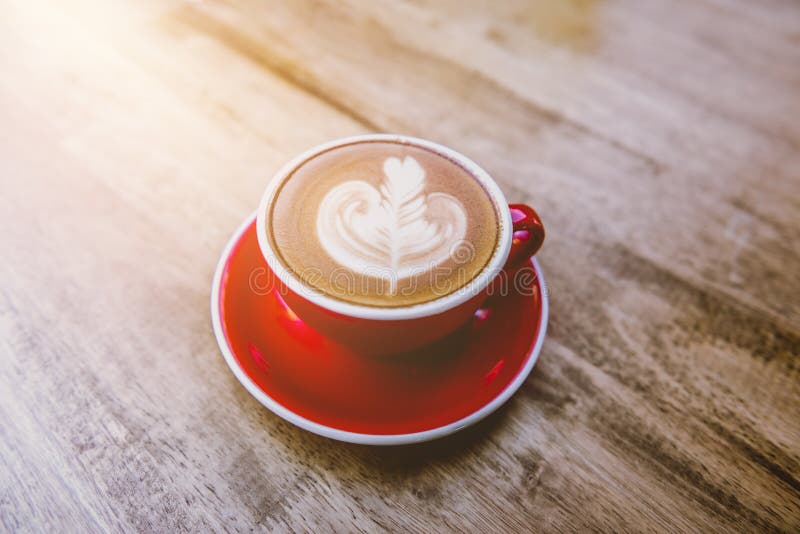 Red Cup of Hot Latte Coffee with Latte Art Stock Photo - Image of brown