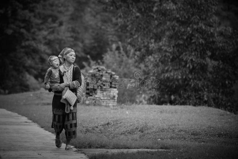 Red Dao hill tribe mother and son