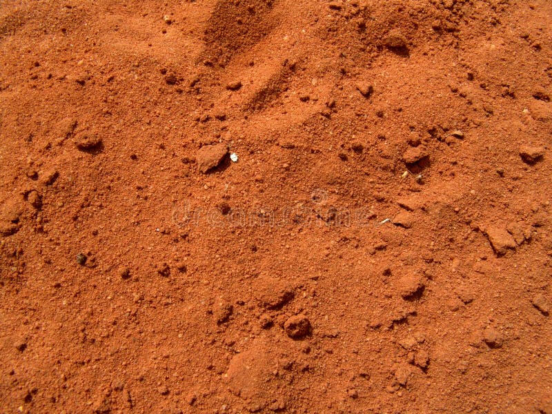 Red Dirt. Texture of red dirt on baseball field Red Dirt. Texture of red dirt on baseball field