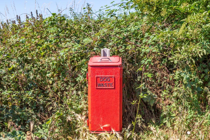 A Dog Waste Bin in the Countryside stock images A Dog Waste Bin in the Countryside stock images