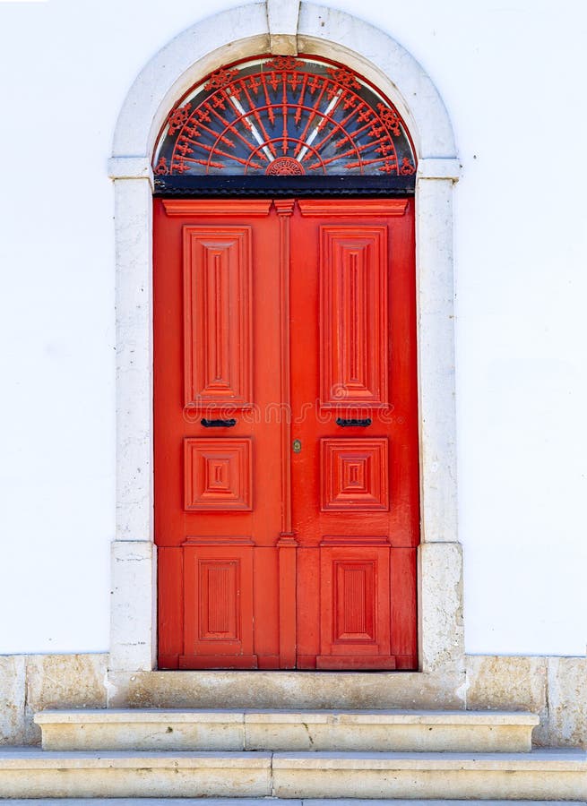 Red door in Mertola, Portugal. Colors of Portugal Series royalty free stock photos Red door in Mertola, Portugal. Colors of Portugal Series royalty free stock photos