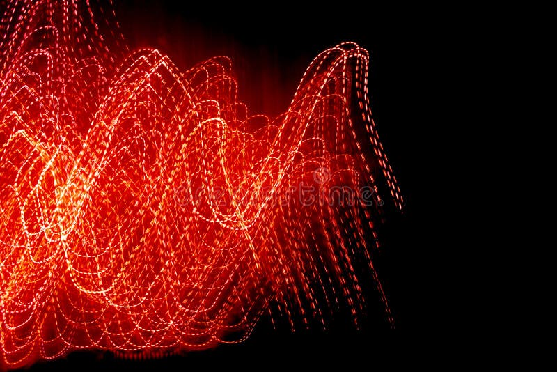 red dotted lines of lights on a black background.