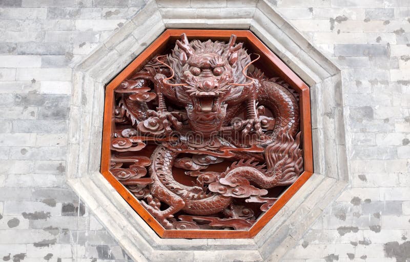 Red dragon carving on wall