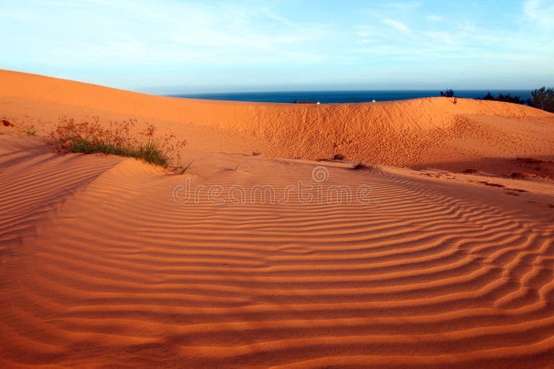 Red dunes, sea and sky. Landscape