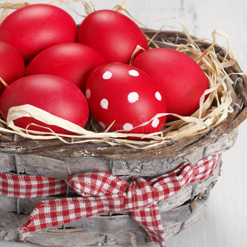 Red Easter eggs in basket stock image. Image of decorated 64613019