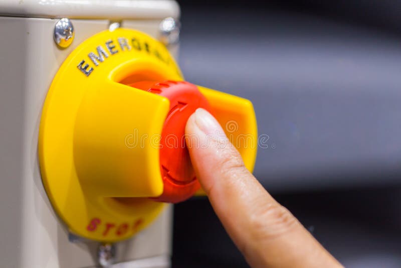 The red emergency button or stop button for Hand press. STOP Button for industrial machine stock photography