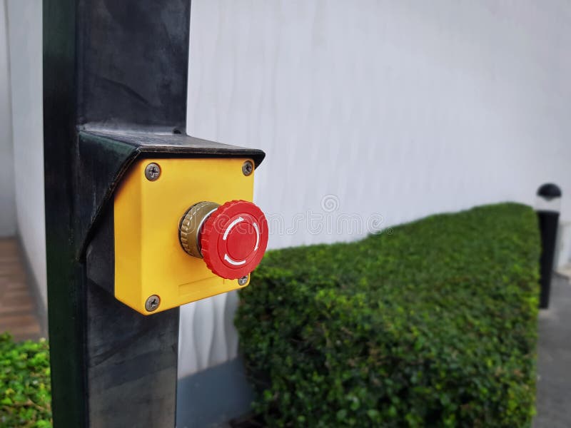 Red Emergency Push Button on Yellow Box stock photo Red Emergency Push Button on Yellow Box stock photo