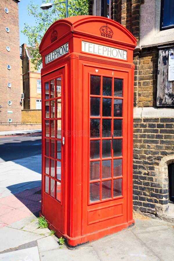 Red Telephone Box in London in Front of St Pancras Hotel. Stock Image