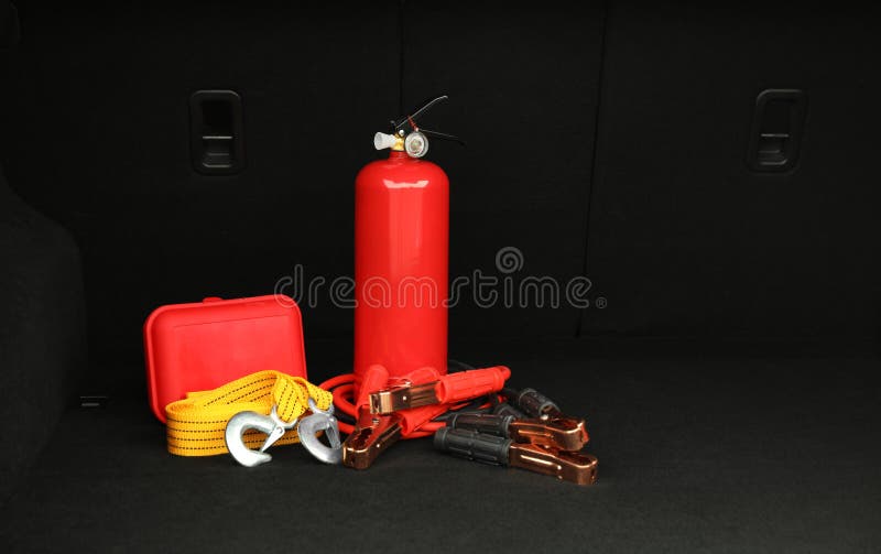 Red Fire Extinguisher, Battery Jumper Cables, Towing Strap and First Aid Kit in Trunk, Space for