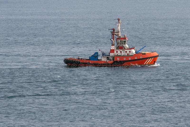 A Red Fire Tug Boat Equipped with Saftey Equipment Stock Image - Image