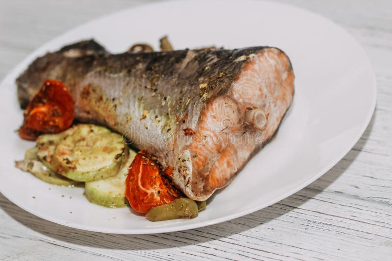 Red Fish Trout Salmon Baked in the Oven with Vegetables. Stock Photo ...