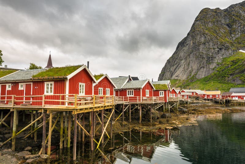 Red fishing huts called Rorbu in Reine, Norway