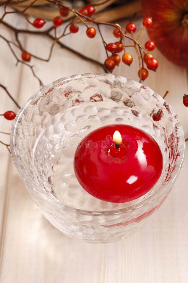 Red floating candle in water stock photos Red floating candle in water stock photos