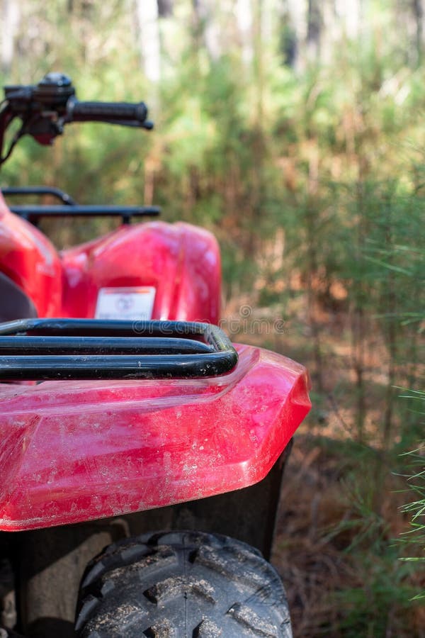 A Red Four Wheeler Close Up Stock Image - Image of camping, pine: 171698881