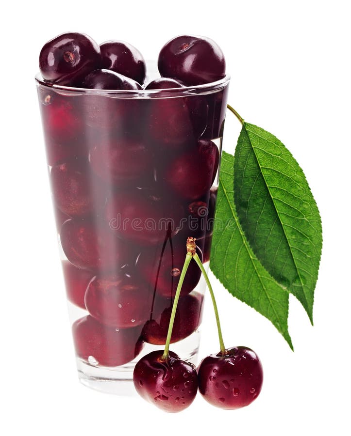 Red fresh wet cherry fruits in transparent glass stock photo