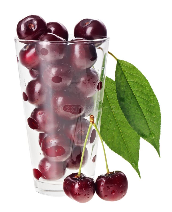 Red fresh wet cherry in transparent glass stock image