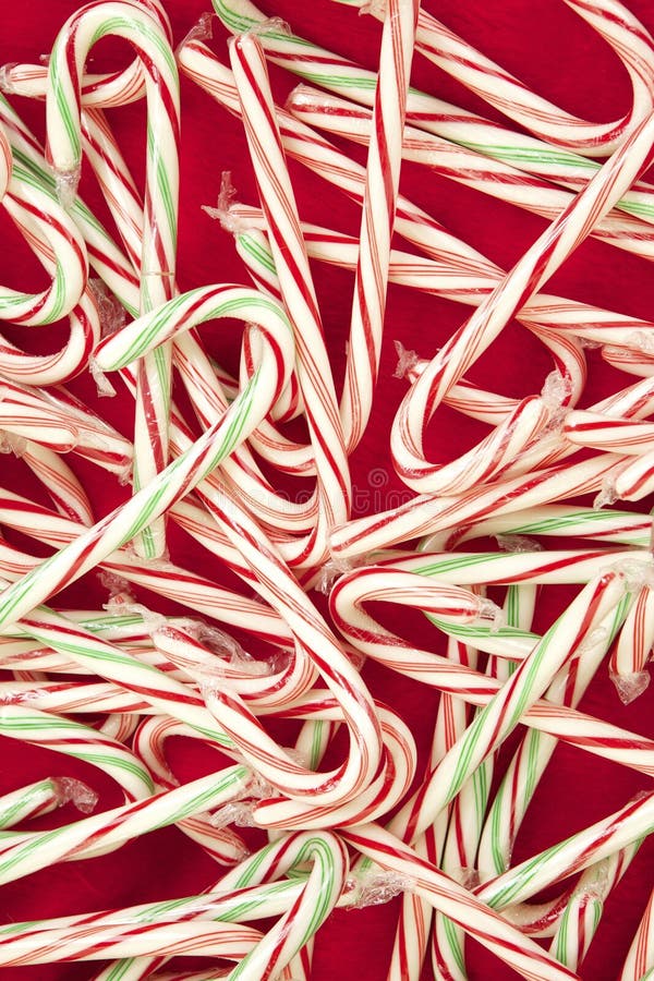 Red Fur with Candy Canes for a Christmas Background stock photo Red Fur with Candy Canes for a Christmas Background stock photo