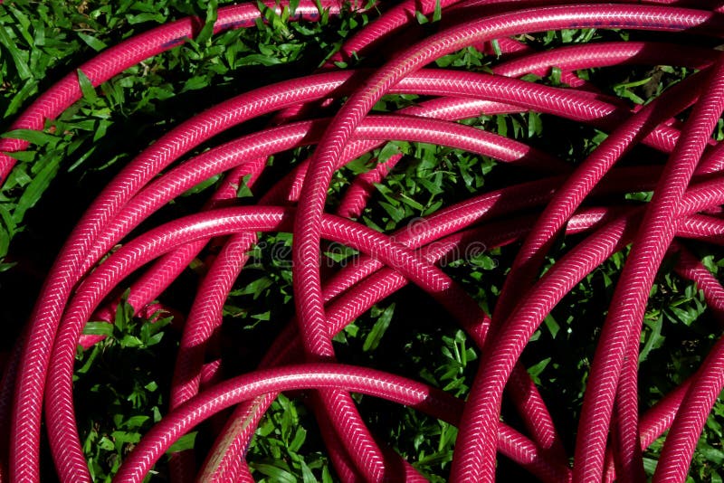 Red Garden Hose stock photo. Image of fiber, plastic 28649756