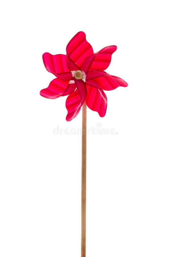 Red garden windmill isolated over white background.