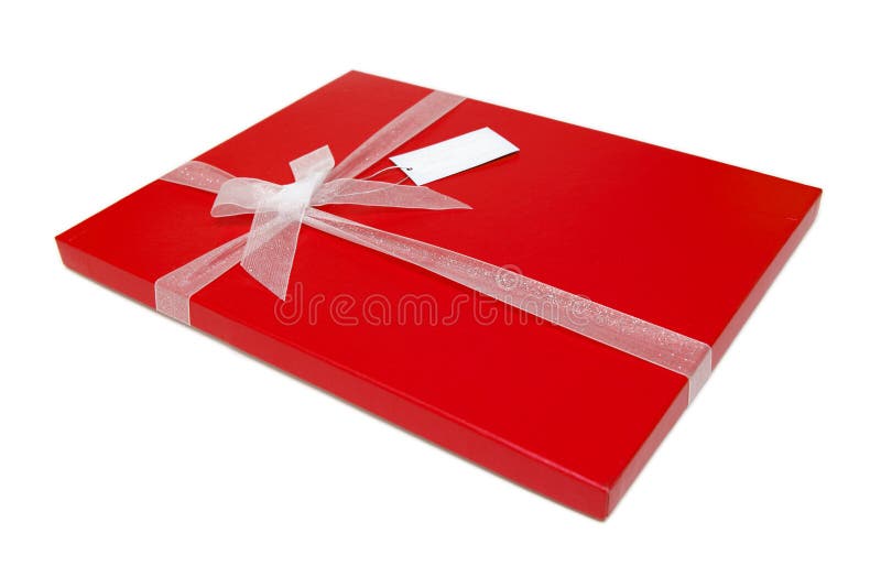 Red gift box with ribbon bow and message tag. Red gift box with ribbon bow and message tag.