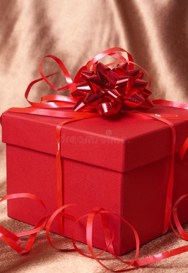 Red gift box with bows