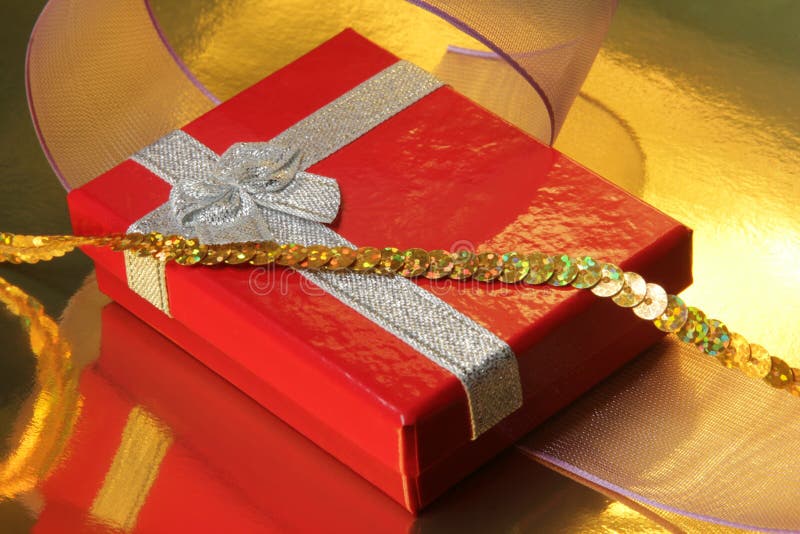 Red gift box. A gift for Christmas, wedding, birthday and Valentine's day stock photo Red gift box. A gift for Christmas, wedding, birthday and Valentine's day stock photo